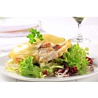 Cheese topped fish fillets with salad