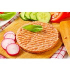 Raw minced meat patty and vegetables