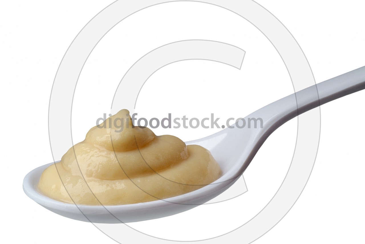 Spoon of fruit puree