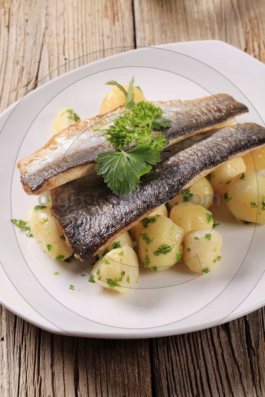 Pan fried trout fillets with potatoes